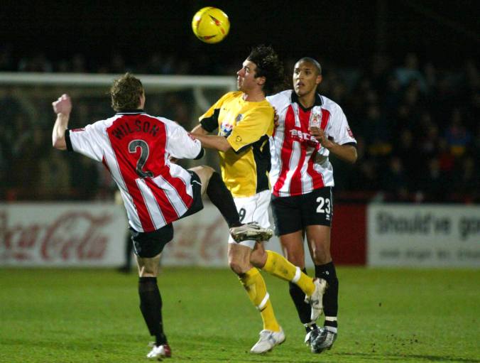 Michael Reddy gets a head in during a 3-2 win at Cheltenham